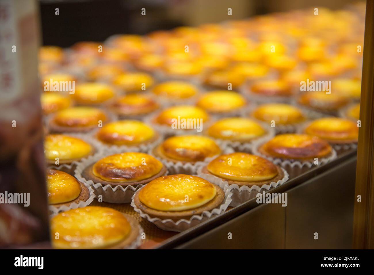 A selective focus shot of freshly baked cheese tarts Stock Photo