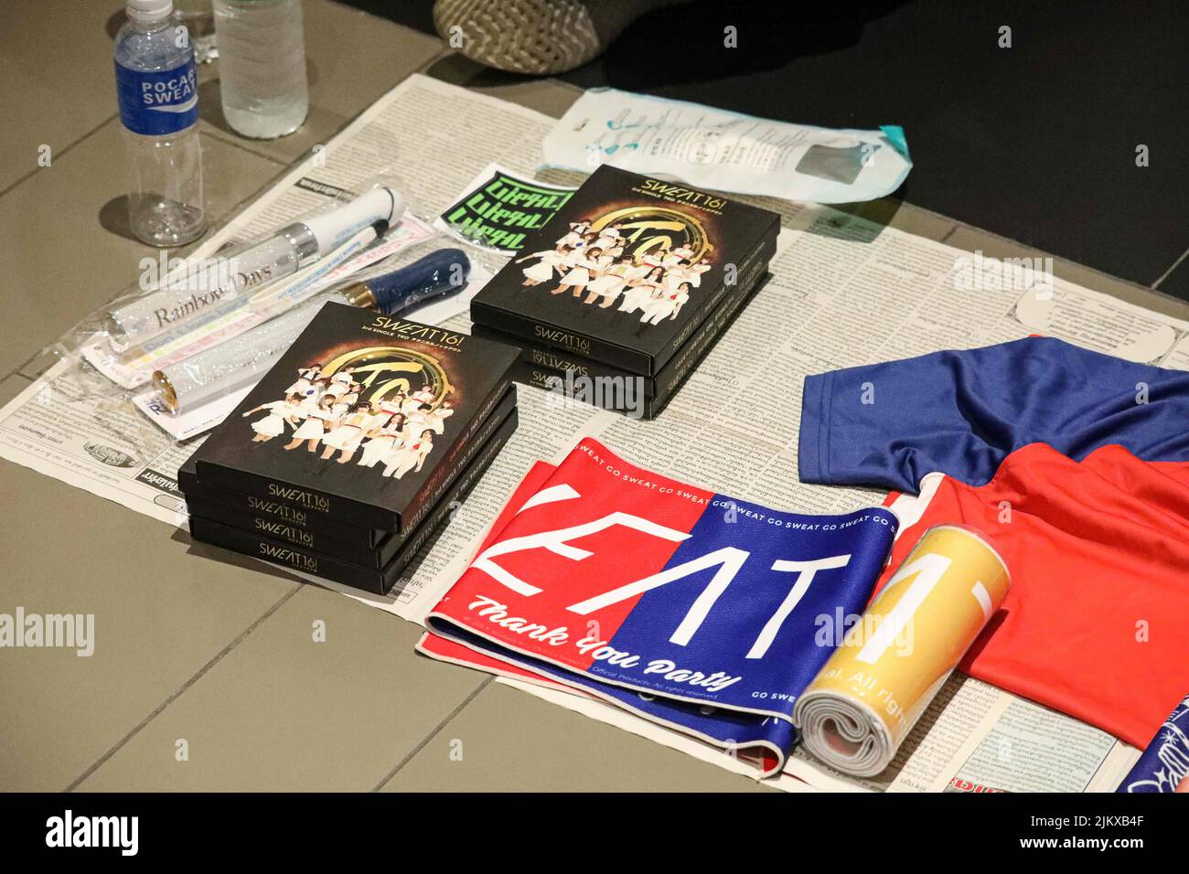 July 31, 2022, Bangkok, Thailand: Various products such as music CDs, pins, photo sets, and other items for the past 5 years of idol group Sweat16 have been sold by fan clubs at the event to fans who don't have them yet to collect. (Credit Image: © Adirach Toumlamoon/Pacific Press via ZUMA Press Wire) Stock Photo