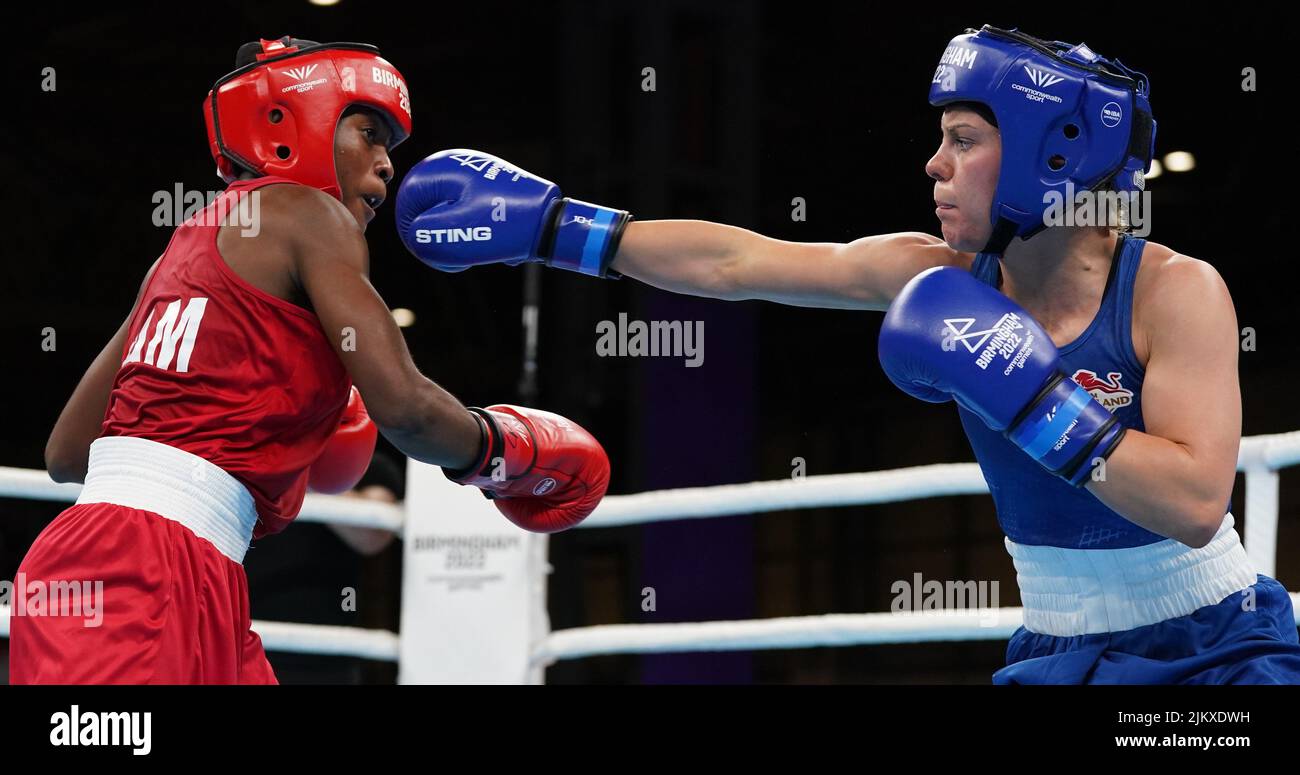 England's Demie-Jade Resztan (blue) during her victory over Zambia's Margret Tembo during the Women’s 45kg-48kg Quarter Final at The NEC on day six of the 2022 Commonwealth Games in Birmingham. Picture date: Wednesday August 3, 2022. Stock Photo