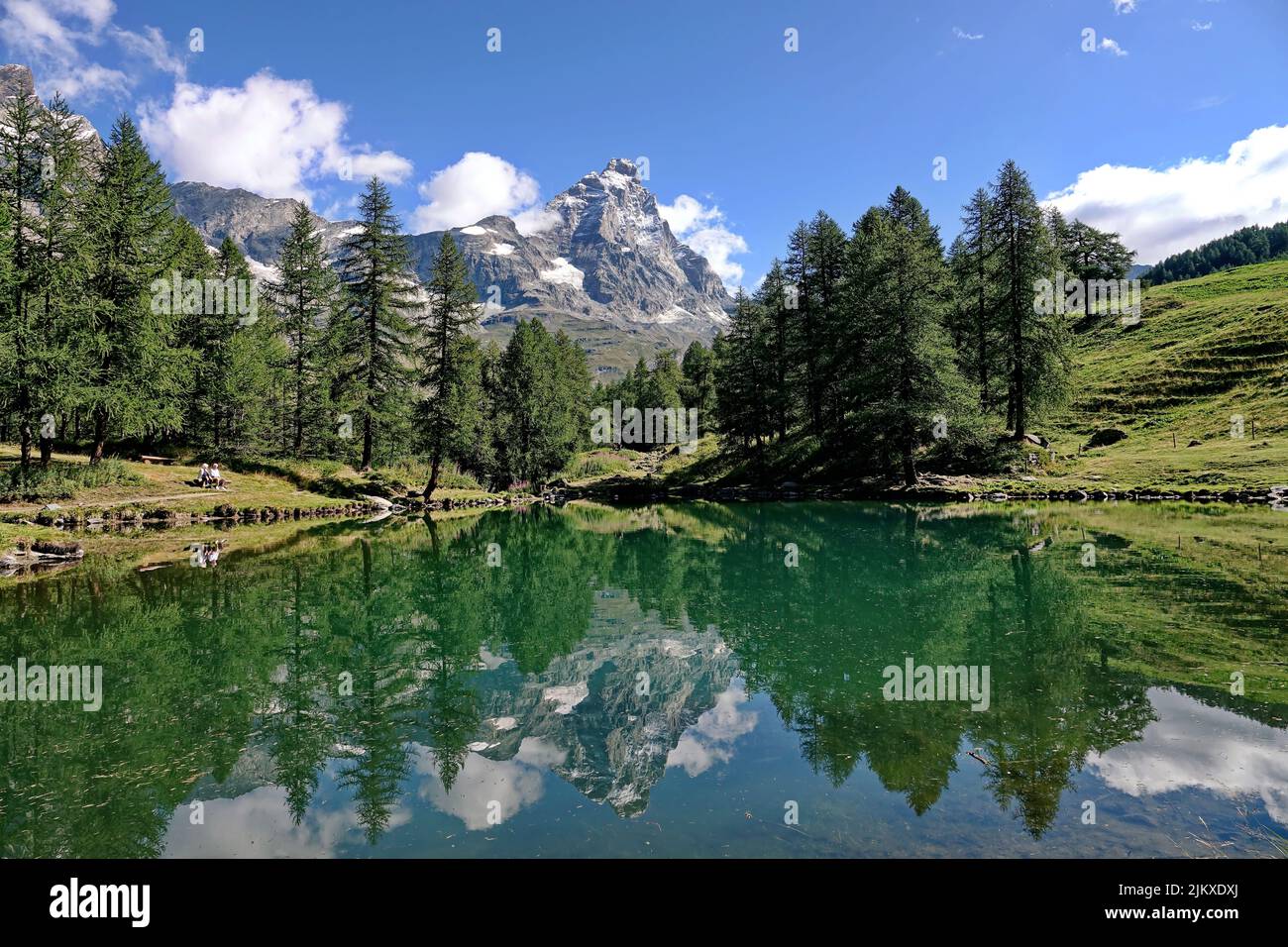Summer alpine landscape with the Matterhorn (Cervino) reflected on the Blue Lake (Lago Blu) near Breuil-Cervinia. Aosta Valley, Italy - August 2022 Stock Photo