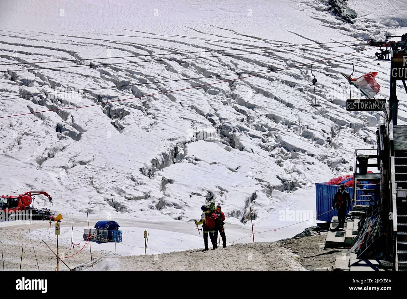 Plateau Rosà glacier, the effects of climate change are evident. Due to little snow and high temperatures at altitude stop summer skiing.  Breuil-Cerv Stock Photo