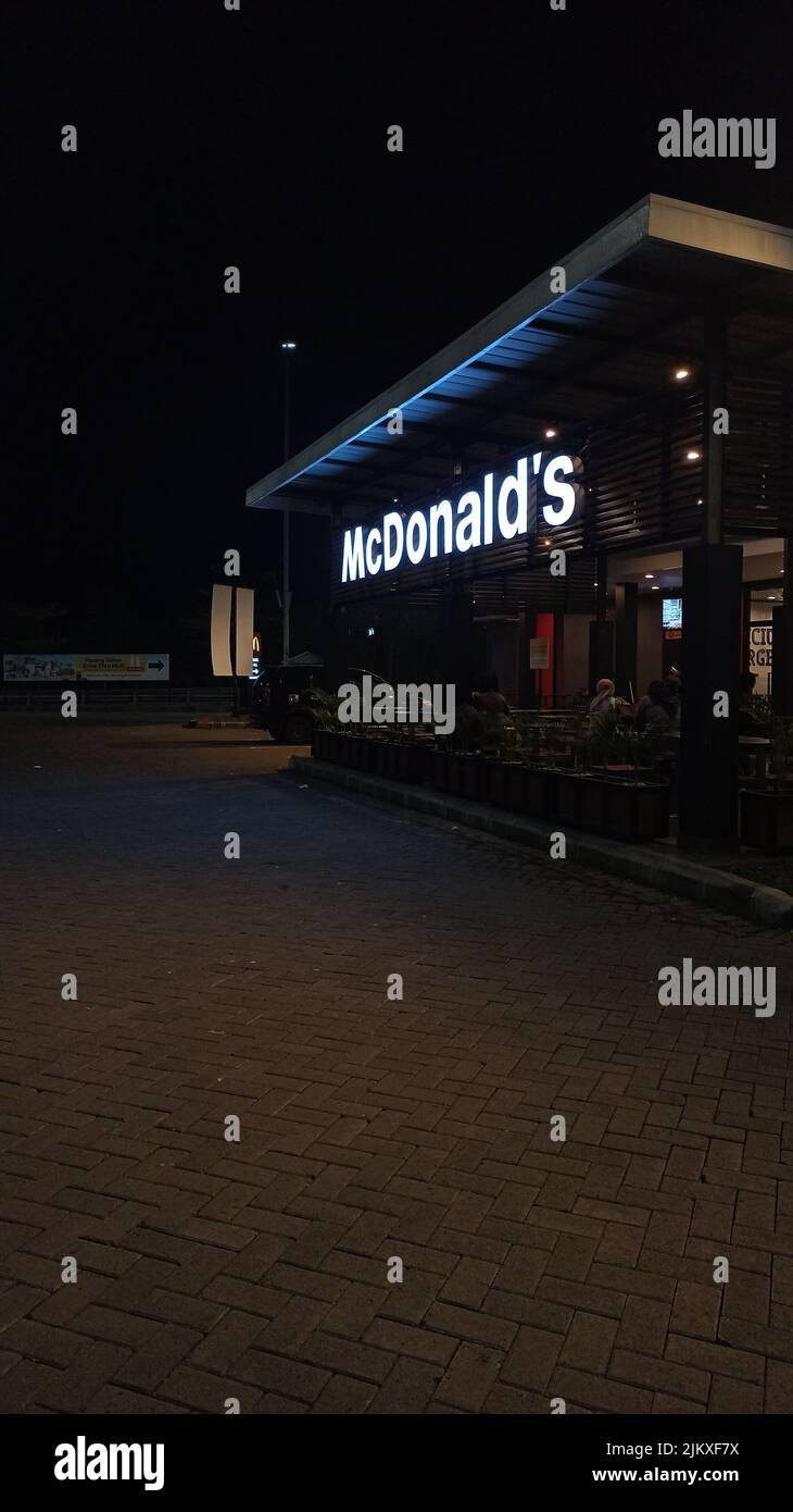 A vertical shot of McDonald #39 s toll rest area in Mojokerto Indonesia A vertical shot of McDonald #39 s toll rest area in Mojokerto Indonesia