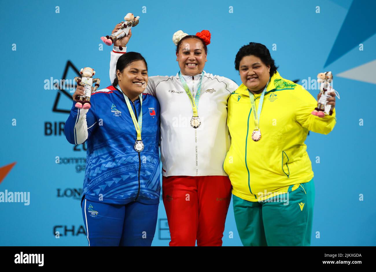 Samoa’s Feagaiga Stowers, England's Emily Campbell and Charisma Amoe Tarrant celebrate with their medals following the Women’s 89kg+ Final at The NEC on day six of the 2022 Commonwealth Games in Birmingham. Picture date: Wednesday August 3, 2022. Stock Photo