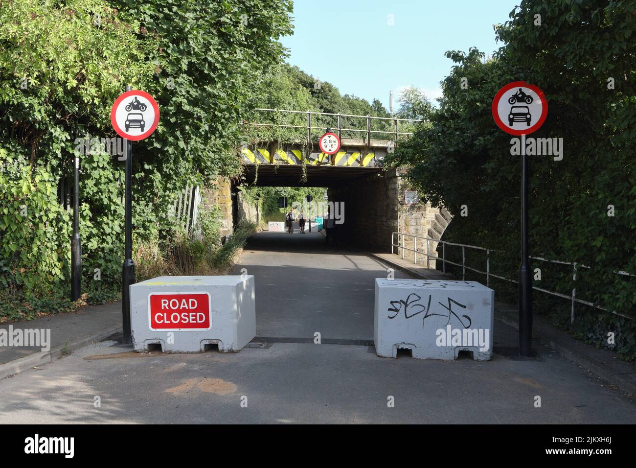 Low railway bridge, Little london road, Sheffield England, road closed to motor vehicles. Pedestrains and cyclists only Stock Photo