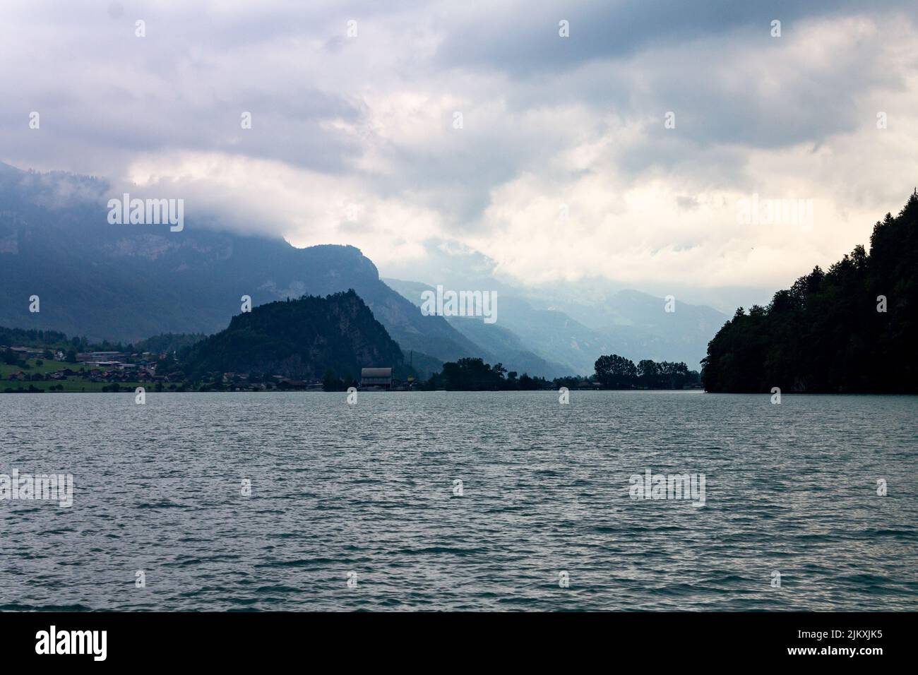 The beautiful view of Lake Brienz against the background of the Alps ...