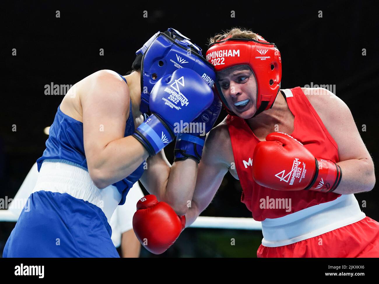 Northern Ireland's Eireann Cathlin Nugent (right) and England's Jodie Charlotte Wilkinson during the Women’s Over 66kg-70kg (Light Middle) - Quarter-Final 3 at The NEC on day six of the 2022 Commonwealth Games in Birmingham. Picture date: Wednesday August 3, 2022. Stock Photo
