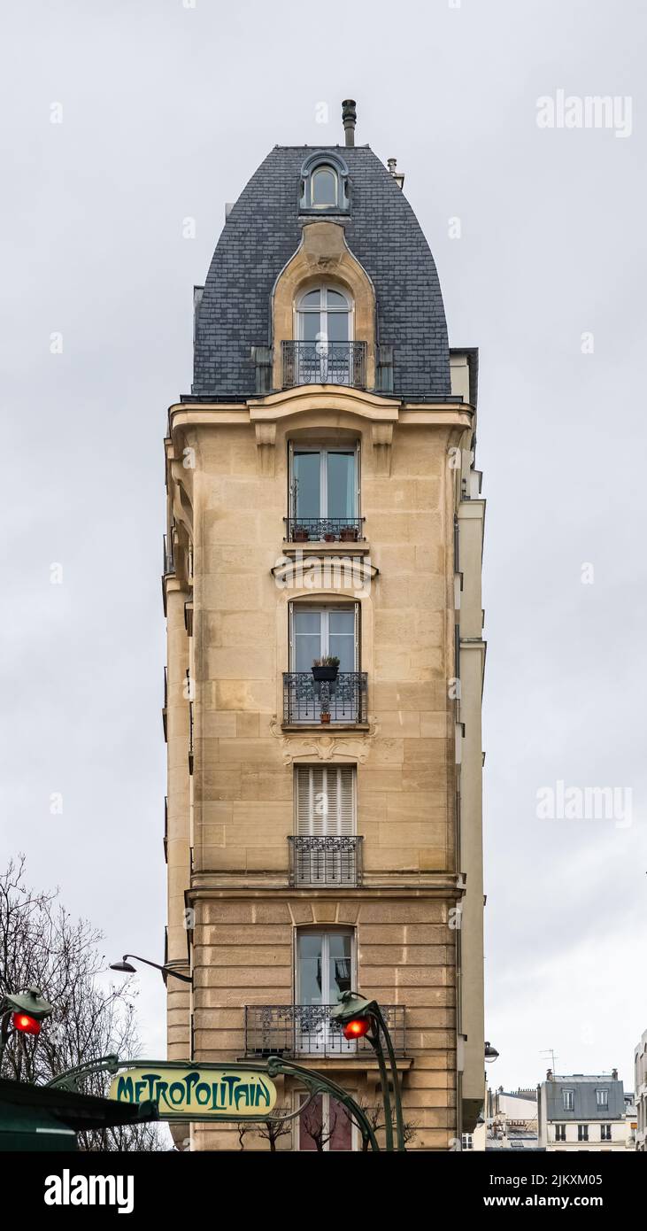 Paris, narrow building boulevard Parmentier, typical parisian facade Stock Photo