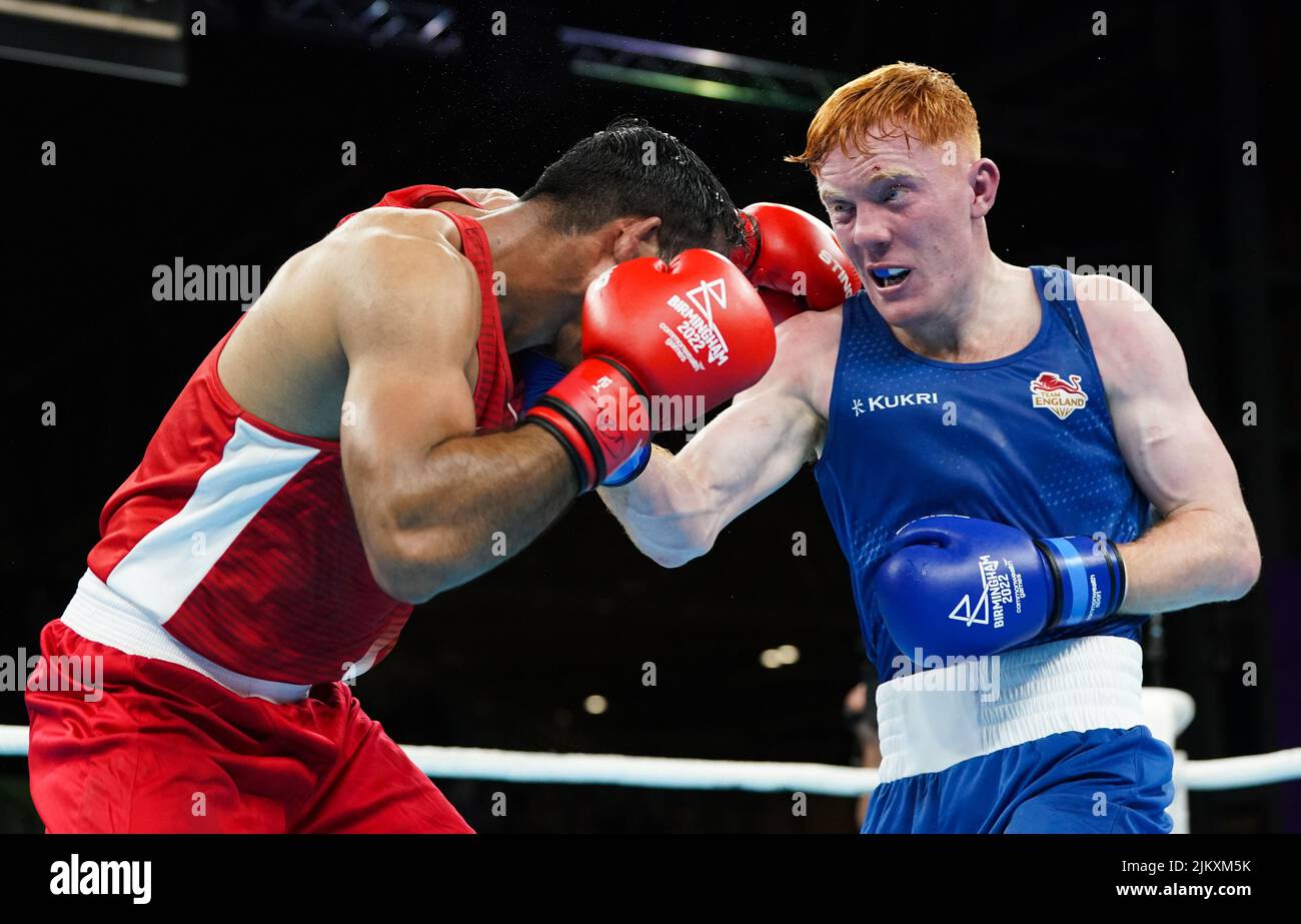 India's Ashish Kumar (left) and England's Aaron Bowen during the Men’s Over 75kg-80kg (Light Heavyweight) - Quarter-Final 3 at The NEC on day six of the 2022 Commonwealth Games in Birmingham. Picture date: Wednesday August 3, 2022. Stock Photo
