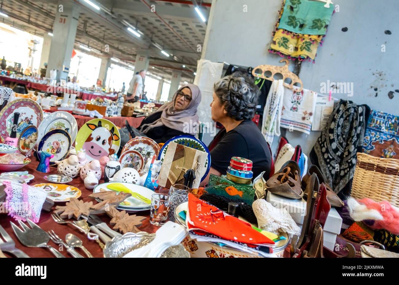 Miscellanious souvenirs seller at Tuesday market (Salı Pazarı) in Istanbul, Turkey Stock Photo