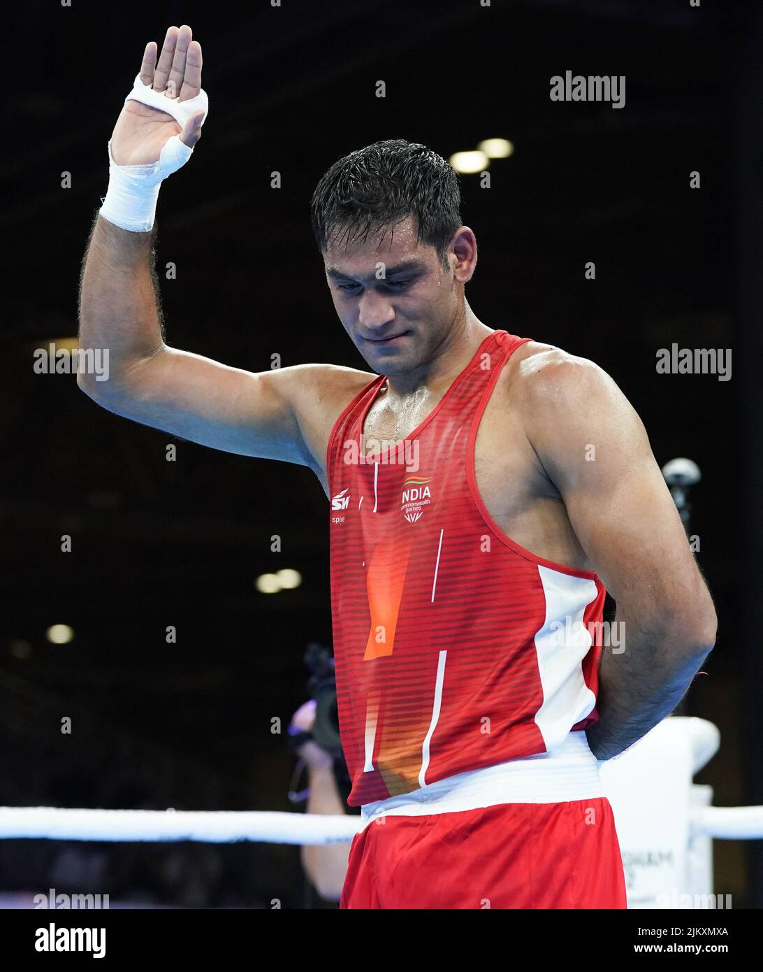 India's Ashish Kumar appears dejected following defeat against England's Aaron Bowen in the Men’s Over 75kg-80kg (Light Heavyweight) - Quarter-Final 3 at The NEC on day six of the 2022 Commonwealth Games in Birmingham. Picture date: Wednesday August 3, 2022. Stock Photo