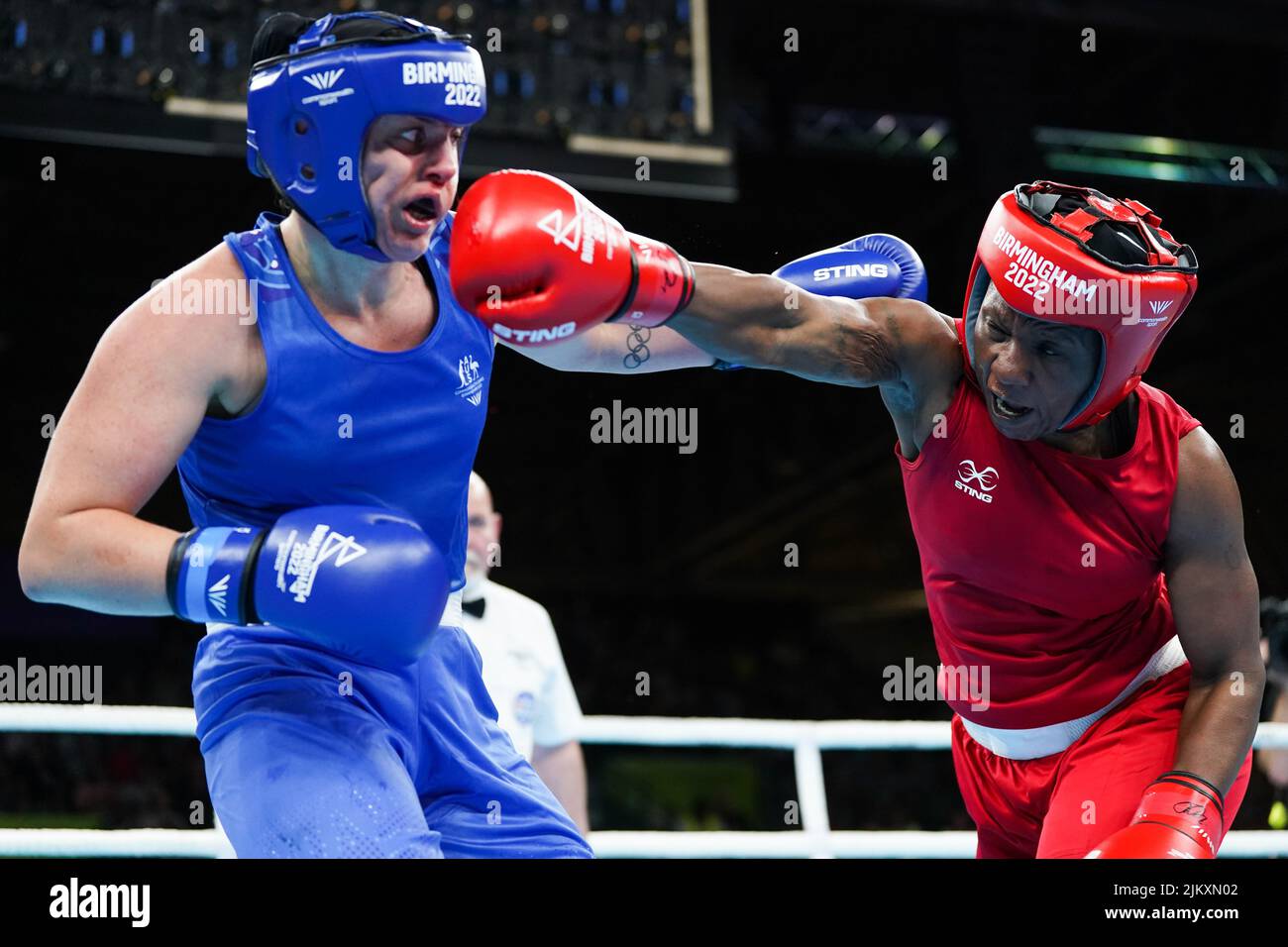 Kenya's Elizabeth Adhiambo Andiego (right) and Australia's Caitlin Anne Parker in action during the Women’s Over 70kg-75kg (Middleweight) - Quarter-Final 3 at The NEC on day six of the 2022 Commonwealth Games in Birmingham. Picture date: Wednesday August 3, 2022. Stock Photo