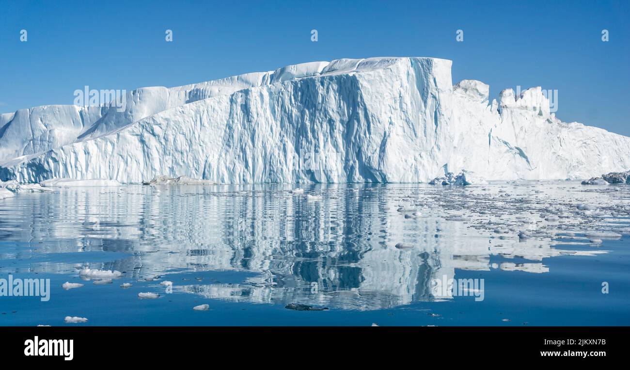 Towering great icebergs in the Ilulissat Icefjord in Greenland Stock Photo