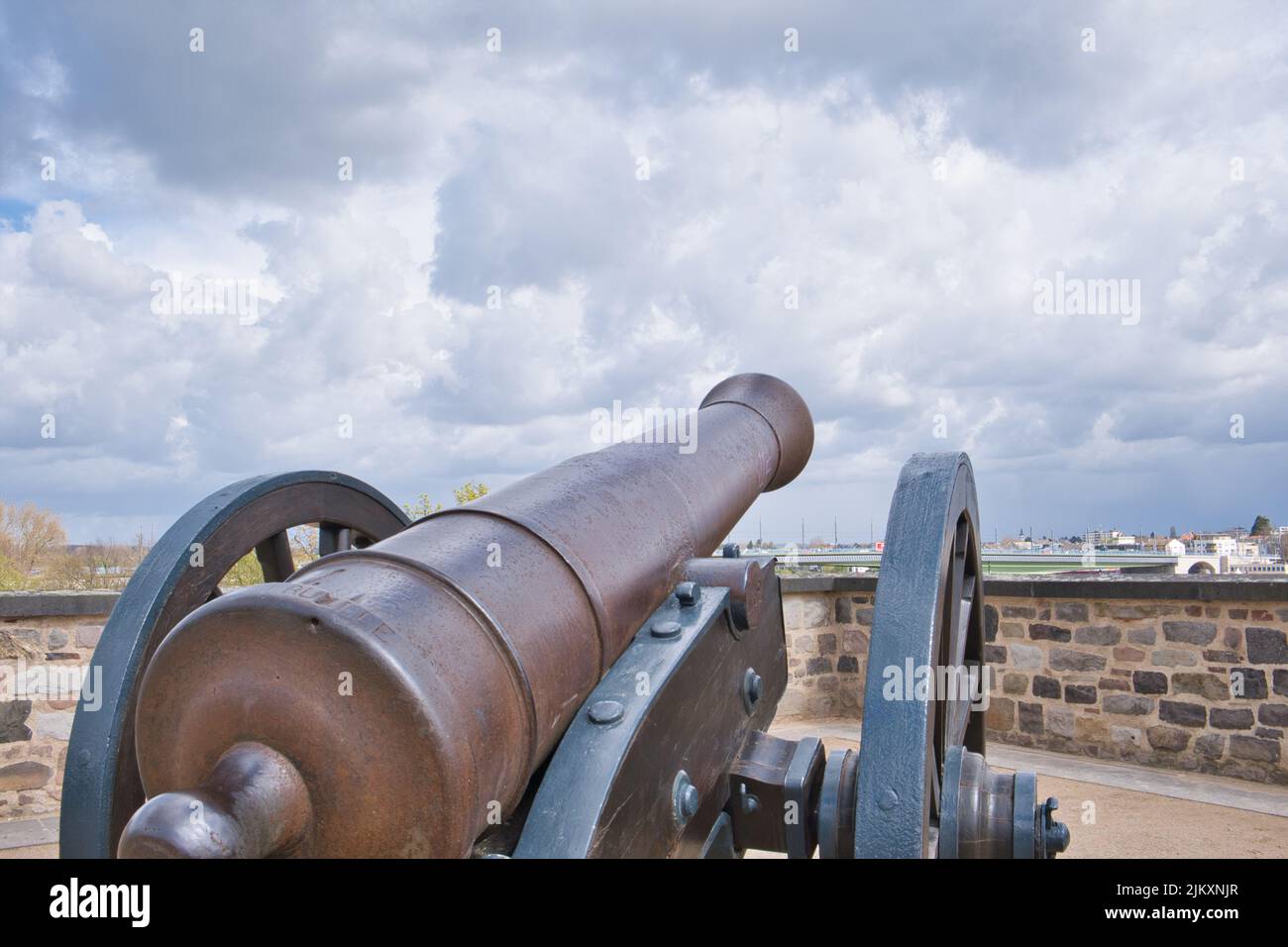 old historical cannon on a carriage on the wall of the old customs in Bonn. rear view Stock Photo