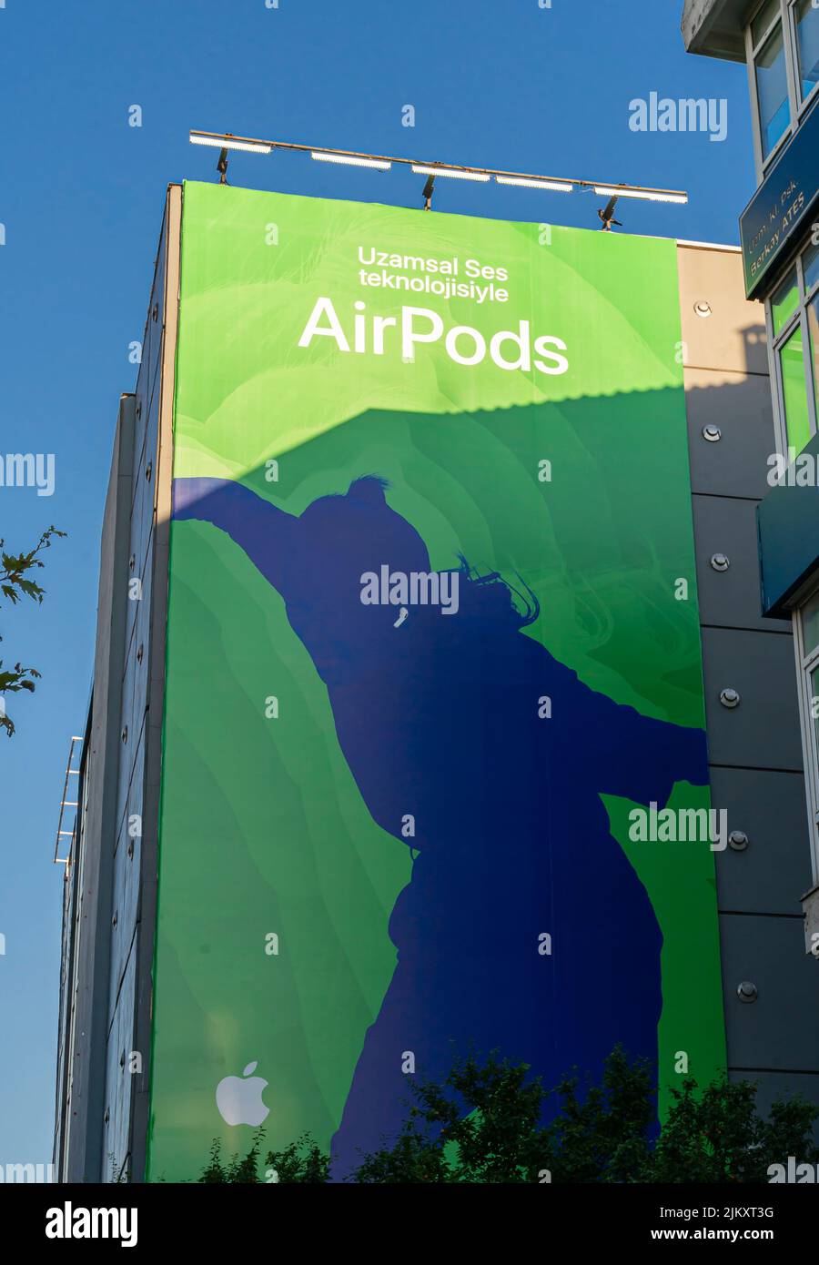 AirPods big wall advertisement in Kadikoy, Istanbul, Turkey Stock Photo