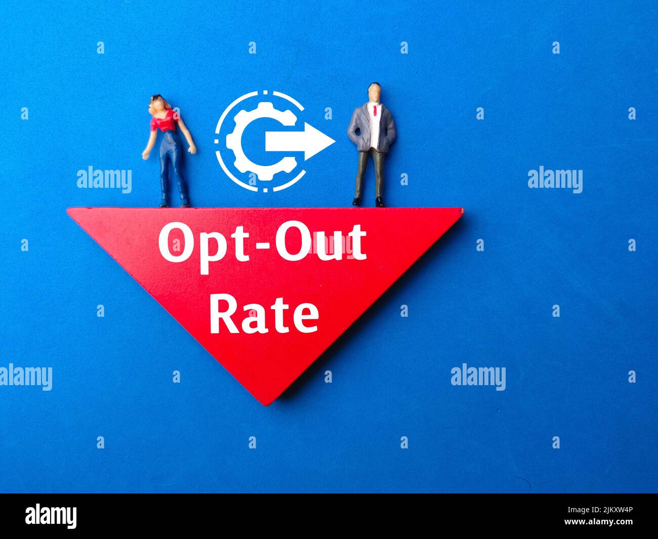 Miniature people and icon with text Opt-Out Rate on blue background. Stock Photo