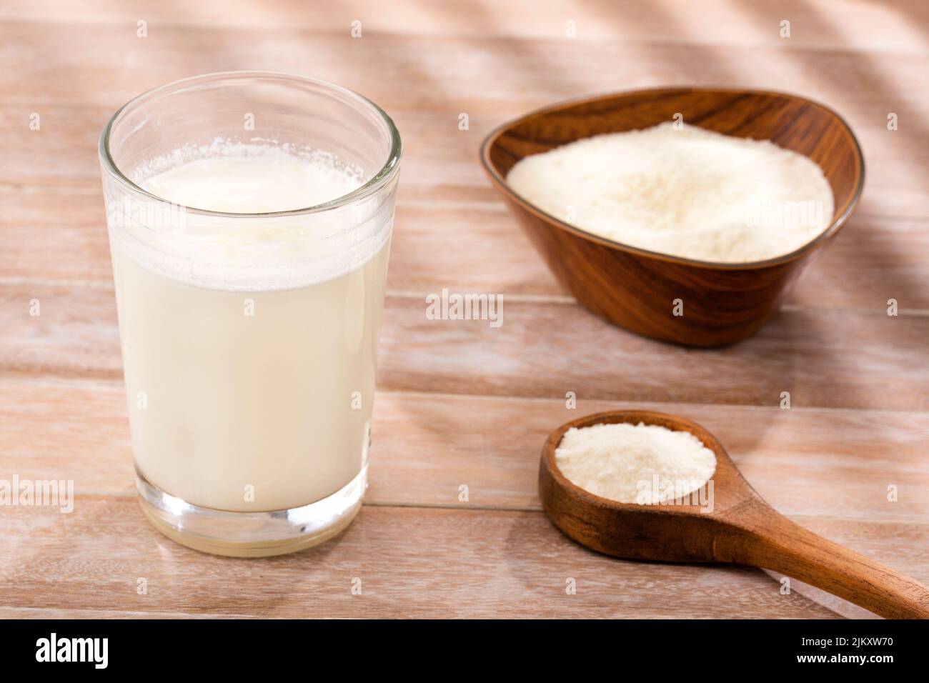 Glass of dehydrated milk powder with nutrients Stock Photo Alamy