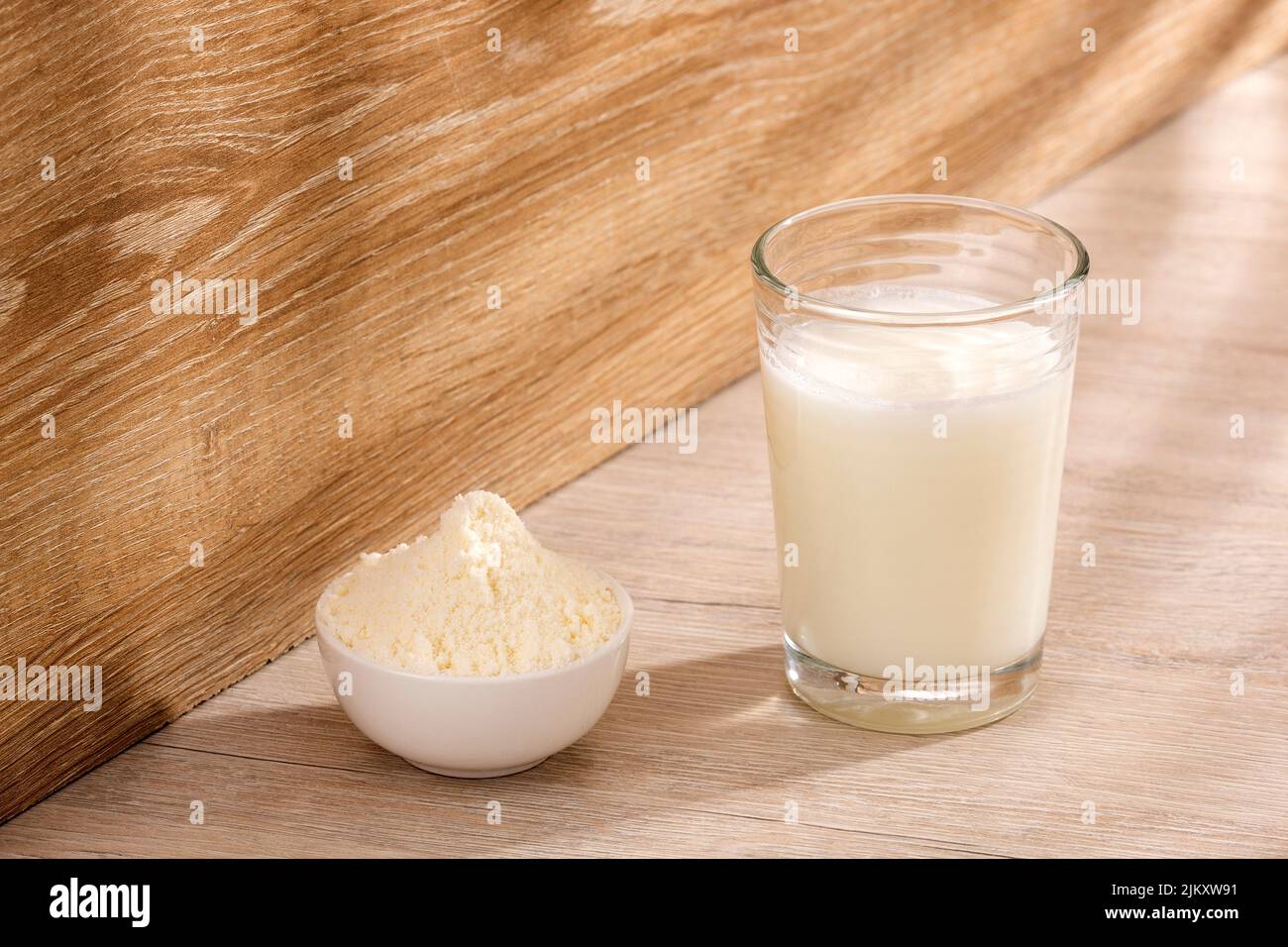 Glass of fresh liquid and powdered milk Stock Photo Alamy