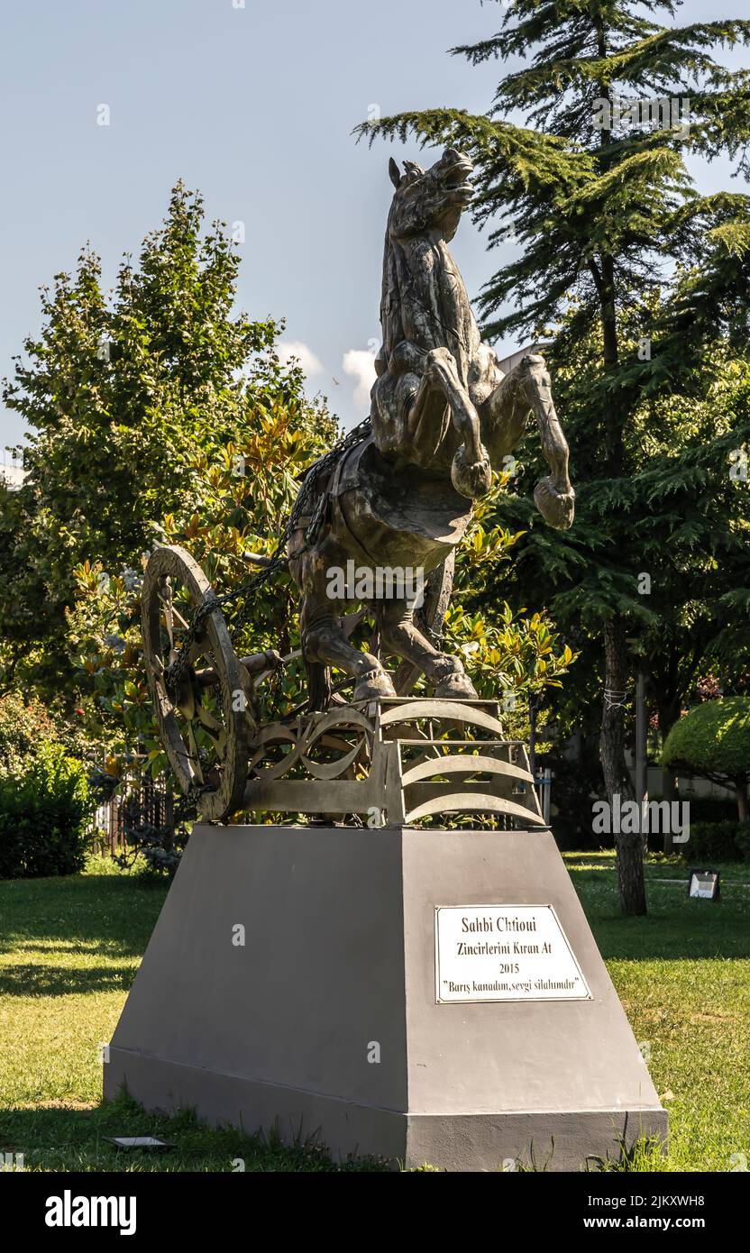 Sculpture of horse breaking out by Sahbi Chtioui, Turkish artist, 'Break the Chains', 2015, Kadikoy, Istanbul, Turkey Stock Photo