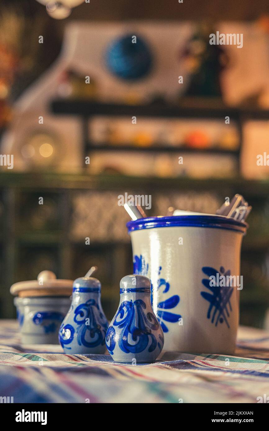 A vertical shot of ceramic dishware on the table Stock Photo