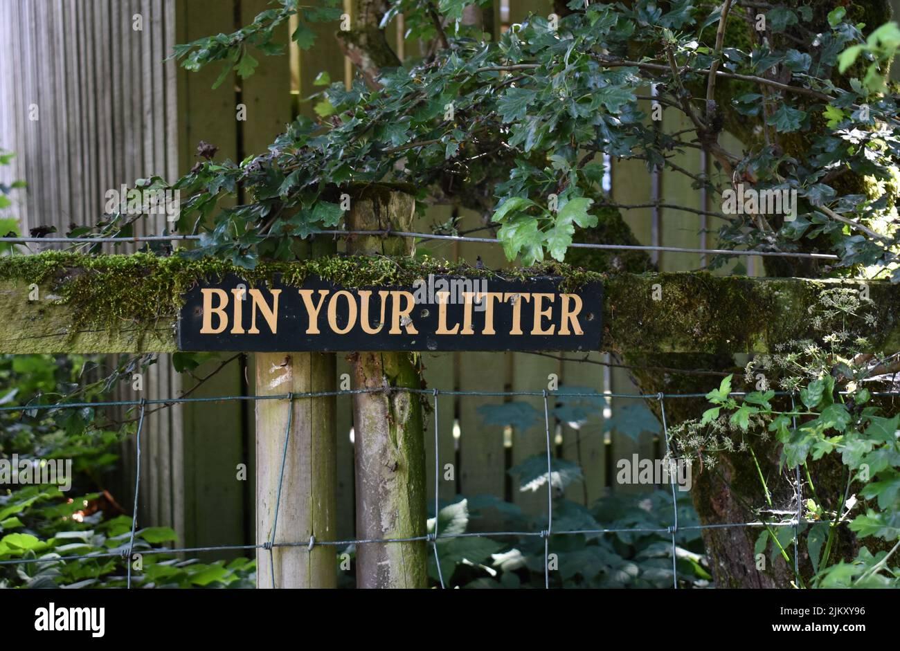 A notice in the Lake District National Park: 'Bin your litter'. Stock Photo