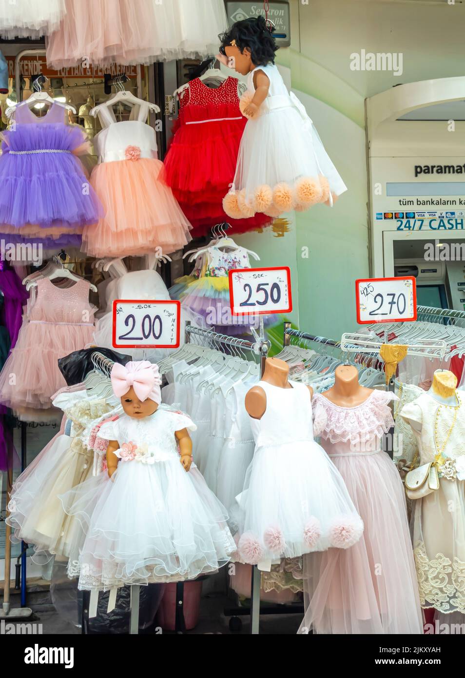 Childrens girls colorful dresses,with price tags sold in the street in