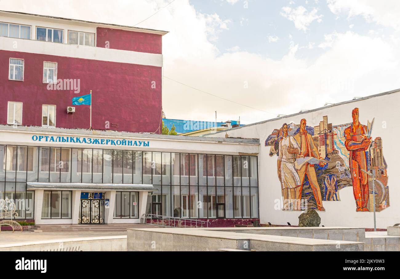 Kazakh tiled mural mosaic on the Union House depicting men and woman of Kazakhstan. Karaganda, Kazakhstan Stock Photo