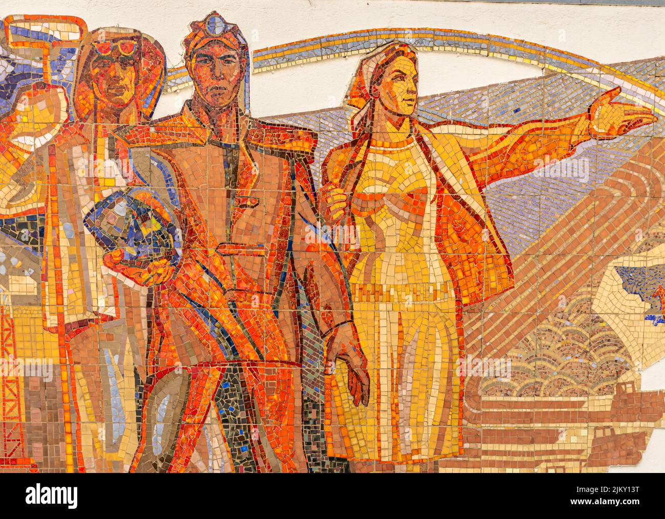 Kazakh tiled mural mosaic on the Union House depicting men and woman of Kazakhstan. Karaganda, Kazakhstan Stock Photo