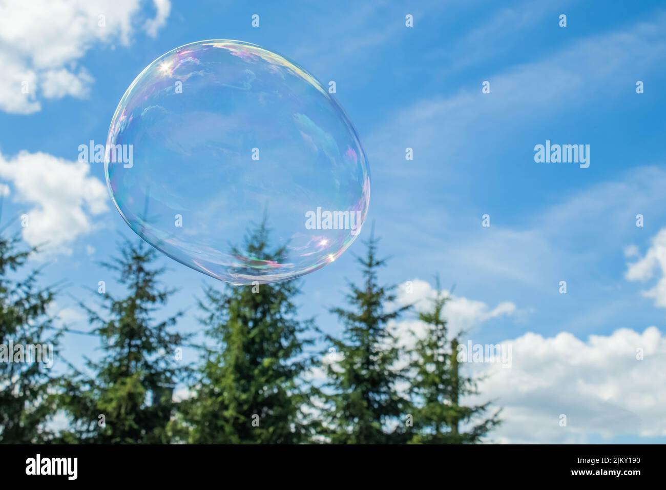 Big soap bubble against the blue sky Stock Photo - Alamy