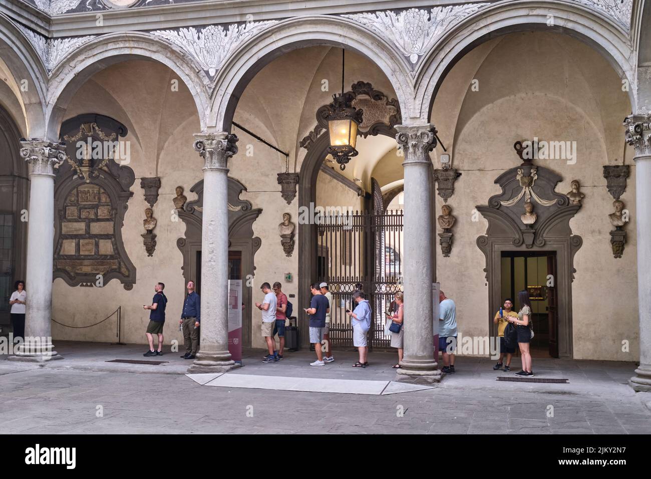 Visitots Queueing in the courtyard of the Riccardi Medici Palace Florence Italy Stock Photo