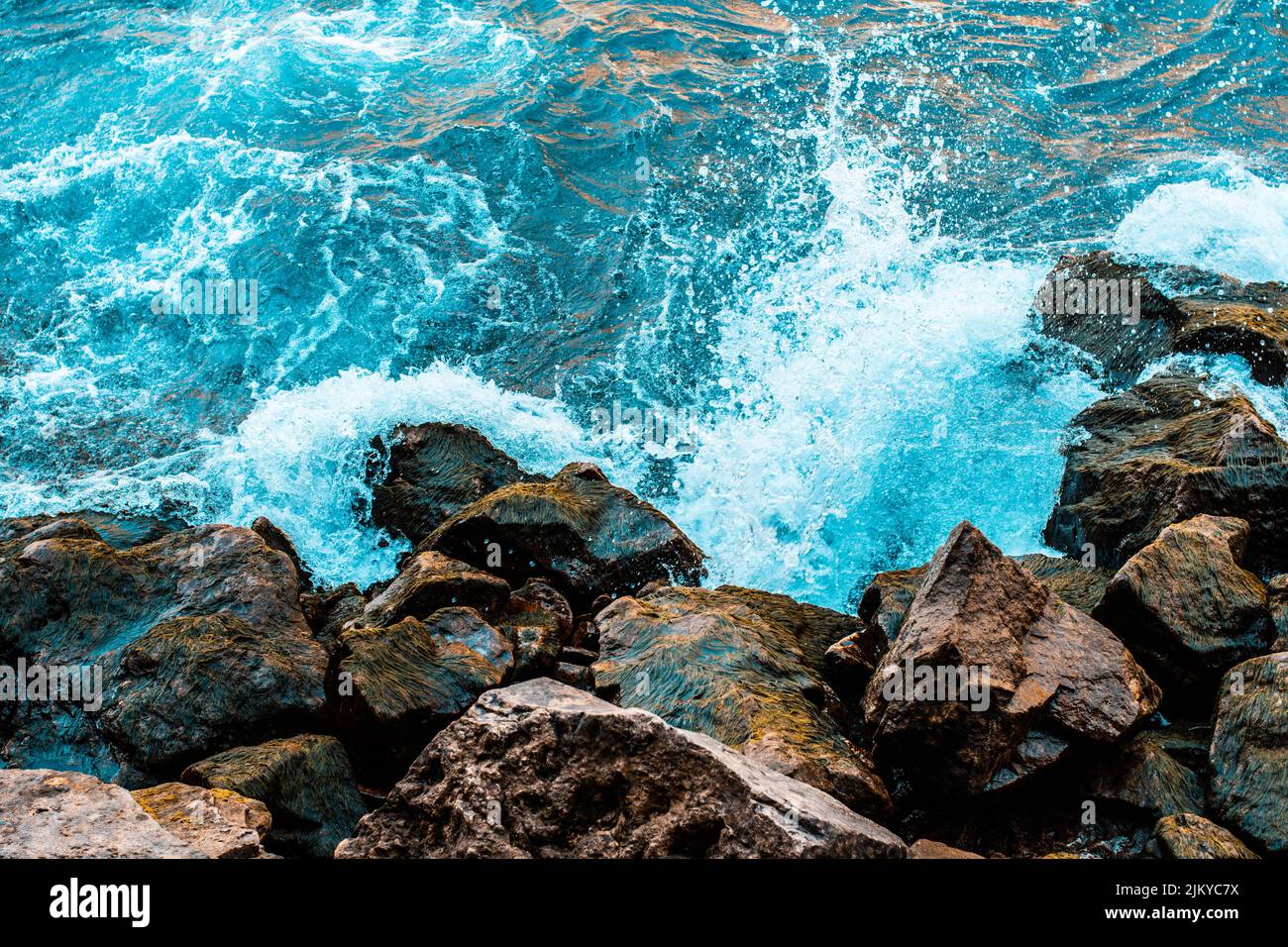 A top view of rocks on the beach Stock Photo - Alamy