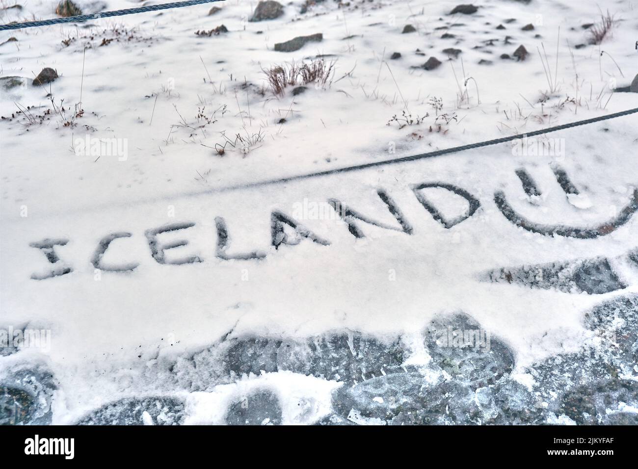 Iceland and smiley face drawn in snow Stock Photo