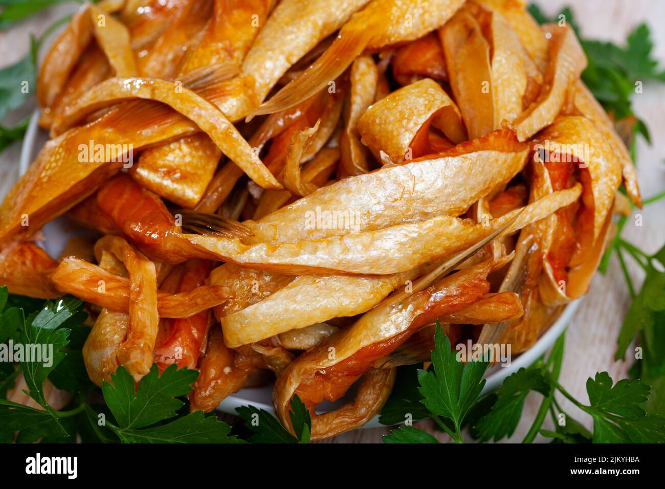 Cold smoked salmon belly strips Stock Photo - Alamy