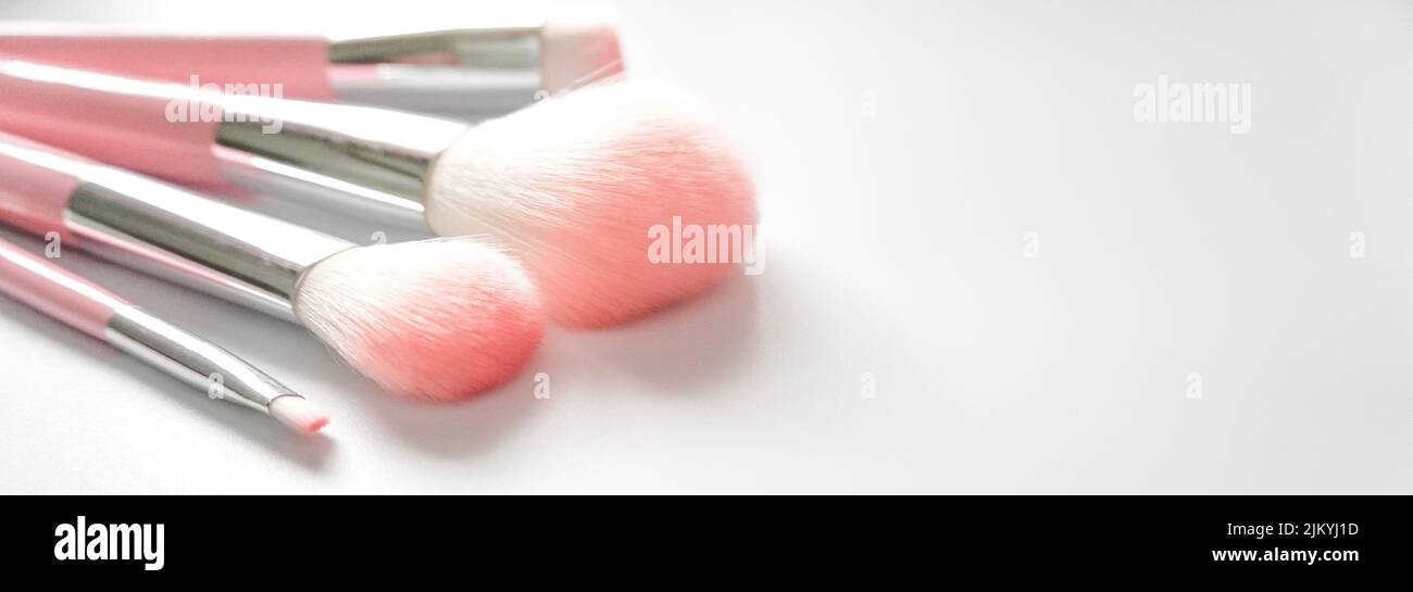 A set of makeup brushes on a white background Stock Photo