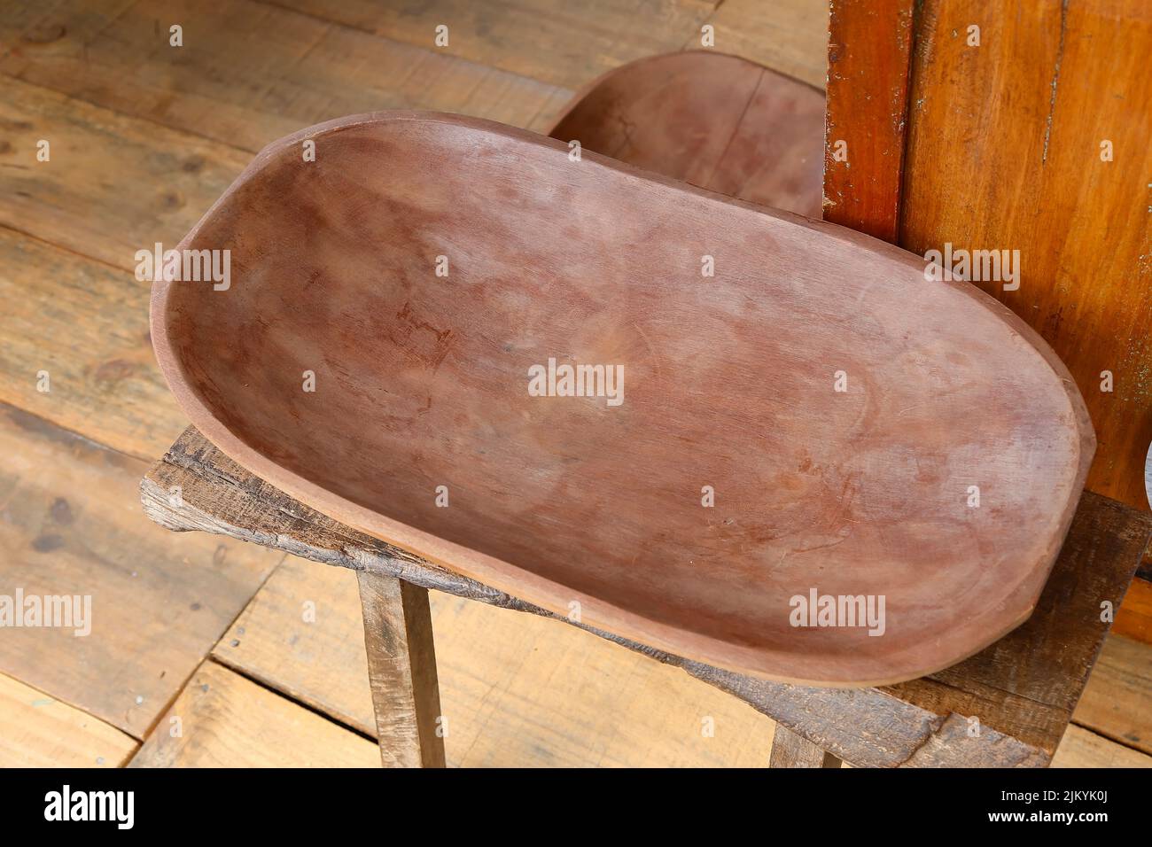 wooden trough - traditional wooden carved container - gamela Stock Photo