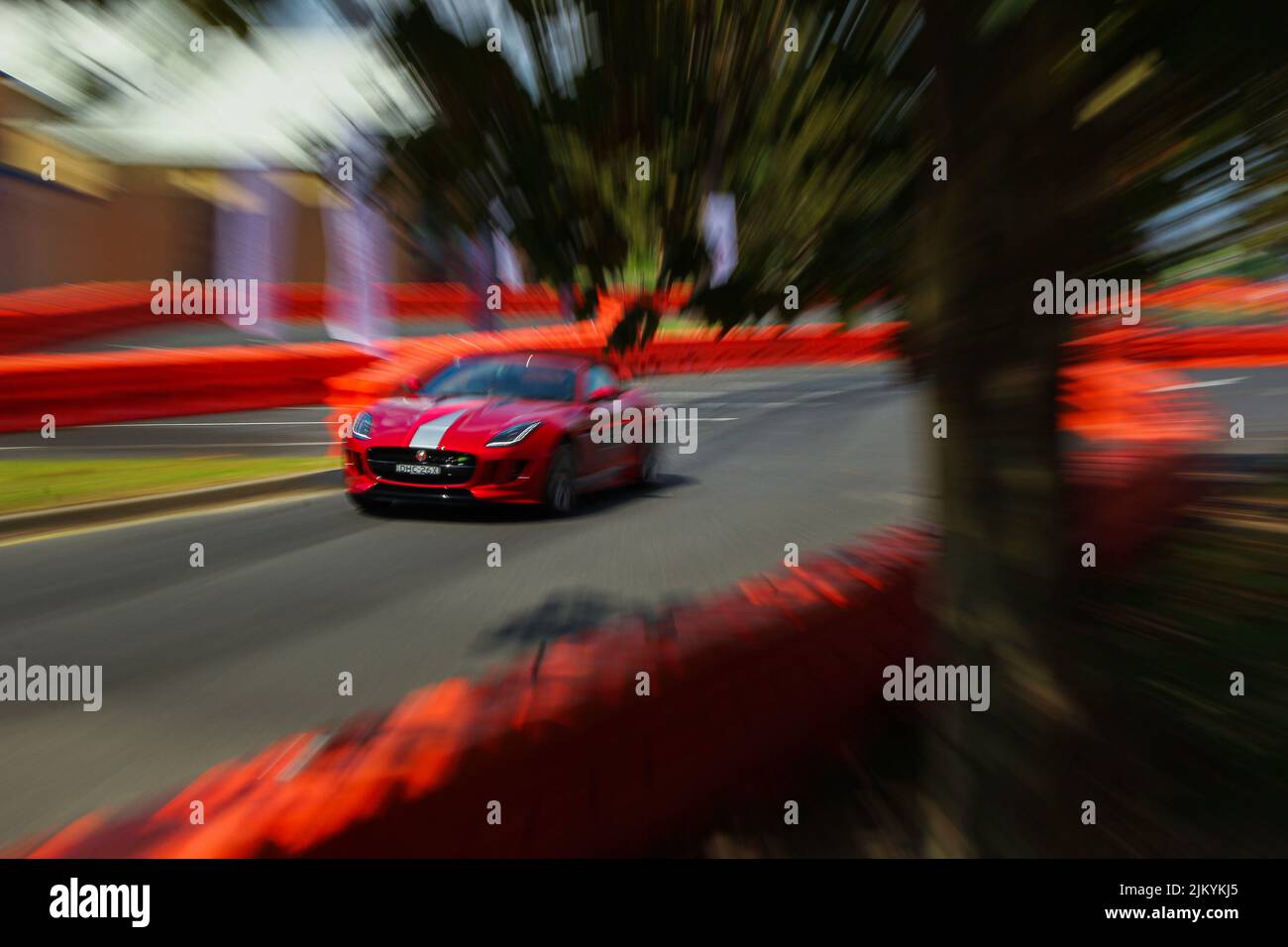 Jaguar sports car acceleration on a race track Stock Photo Alamy