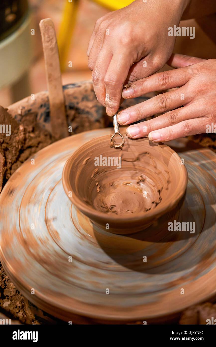 Craftsmen in pottery shop making clay pottery Stock Photo Alamy
