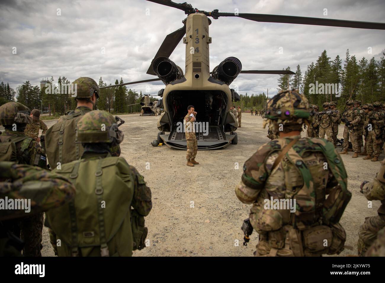 U.S. Soldiers, assigned to “Viper” Company, 1st Battalion, 26th Infantry Regiment, 2nd Brigade Combat Team, 101st Airborne Division (Air Assault), join Finnish high-readiness soldiers, assigned to Kainuu Brigade, for safety and embarkation briefs of a U.S. Army CH-47 Chinook at Sodankyla, Finland, July 24, 2022. U.S. Soldiers conducted the training alongside Finnish and Norwegian soldiers in preparation for Exercise Ryske 2022, a combined joint training exercise that aims to improve the tactics, techniques, and procedures of its participants and strengthen relations between partner nations.  ( Stock Photo