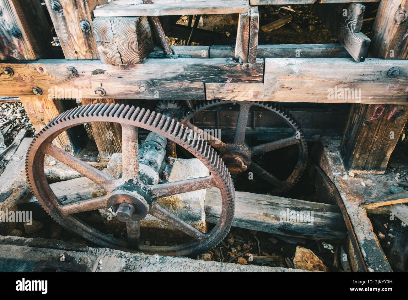 An old wooden structure with rusty metal wheels in Silverton, Colorado Stock Photo Alamy