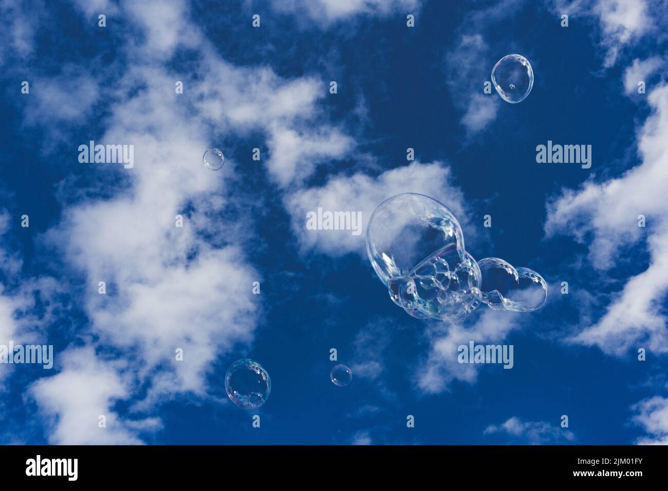 Low angle shot white clouds hi-res stock photography and images - Alamy