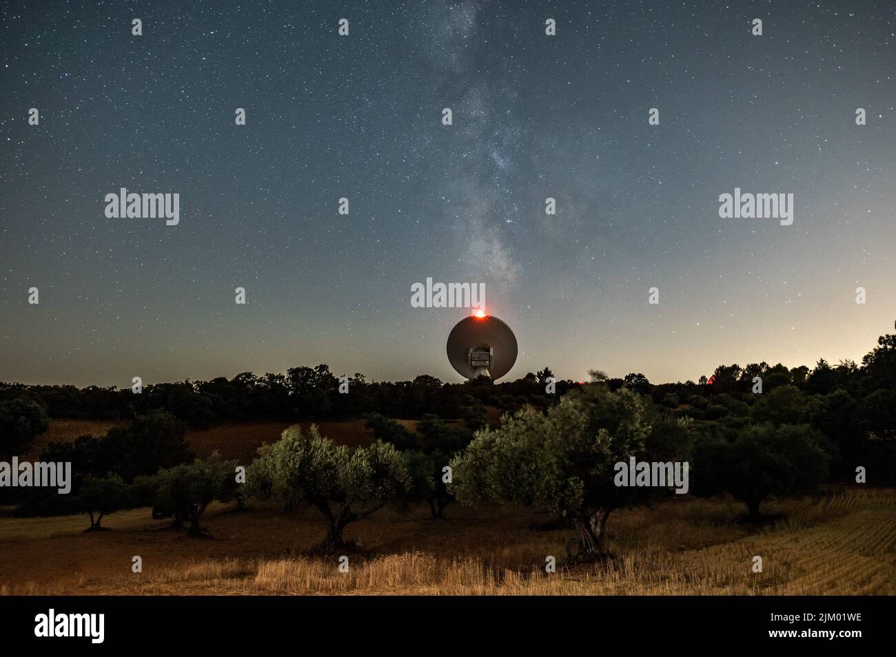 Guadalajara, Spain. 04th Aug, 2022. The Milky Way rises during a clear summer night over a radio telescope from the Yebes Observatory, the main scientific and technical facility of the National Geographic Institute of Spain. Credit: Marcos del Mazo/Alamy Live News Stock Photo