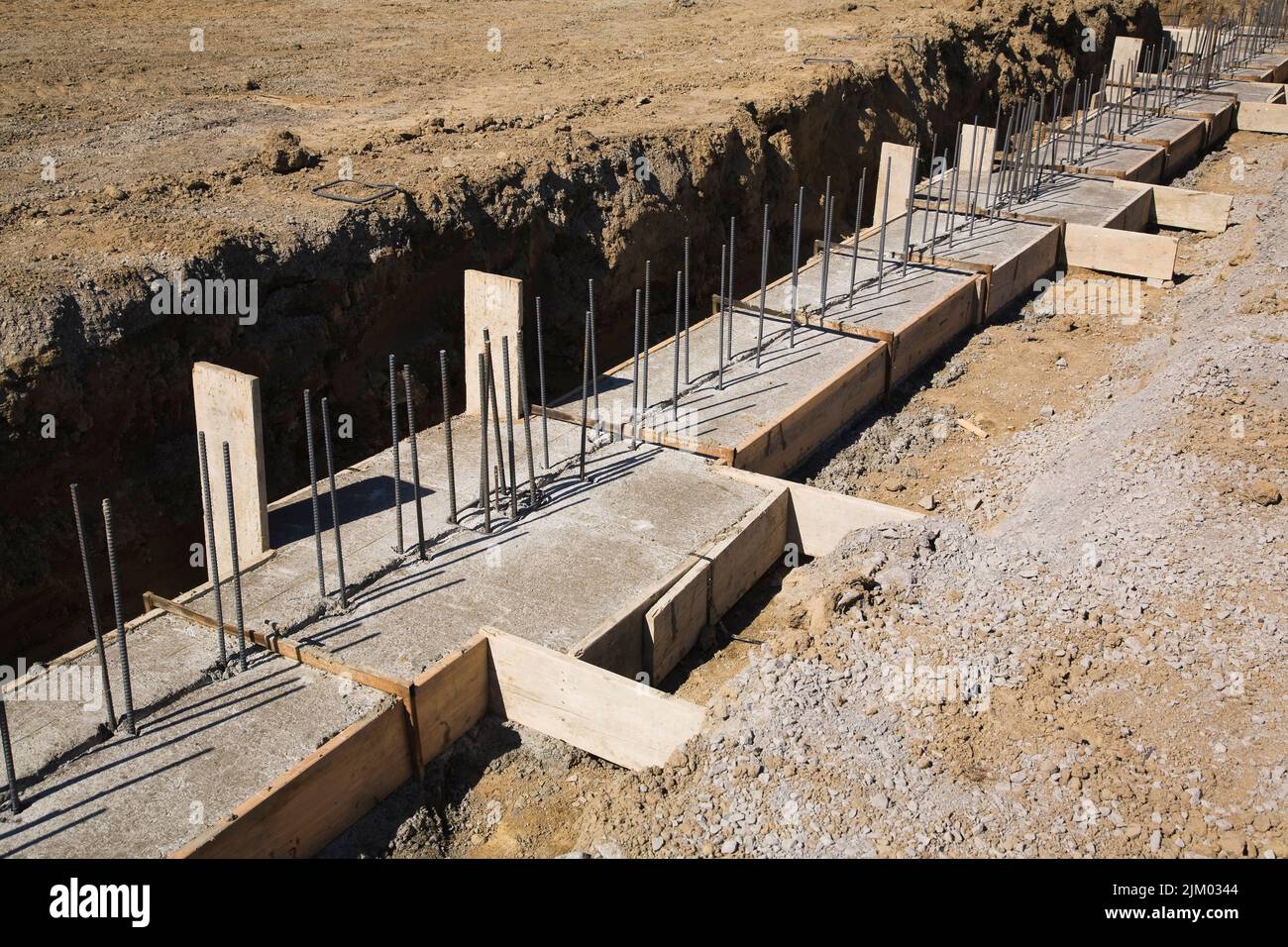 Trench At Construction Site With Reinforced Concrete Footings For Trench At Construction Site With Reinforced Concrete Footings For