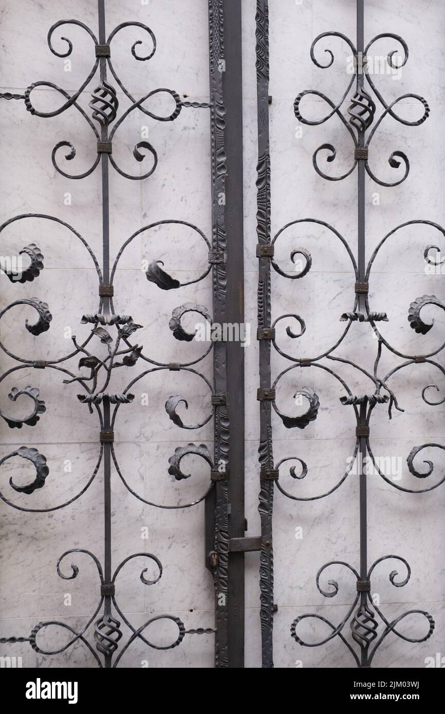 artistically formed old wrought iron grille,old, vintage Stock Photo