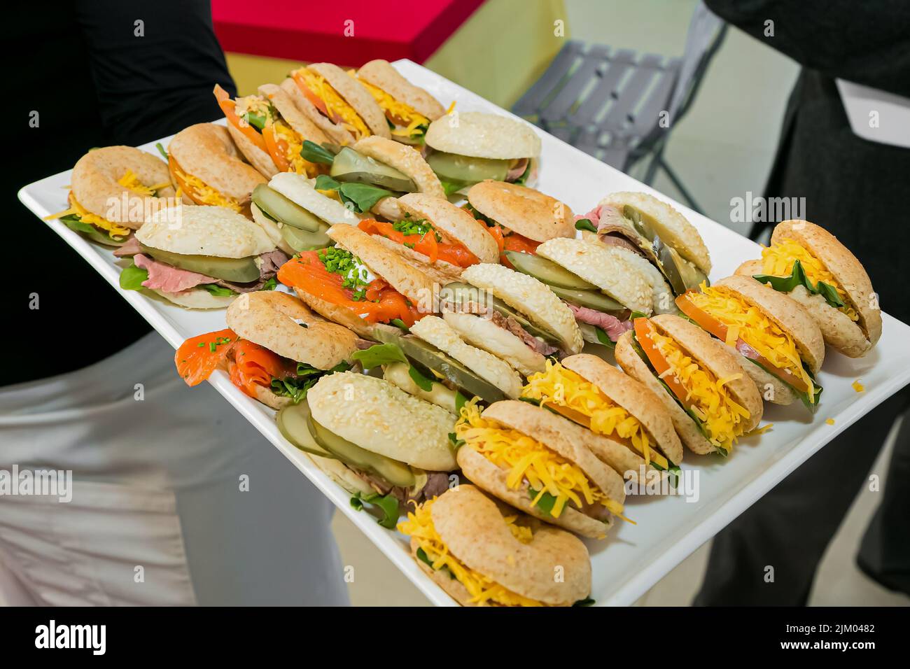 A closeup of baos with vegetables and fish in a restaurant in
