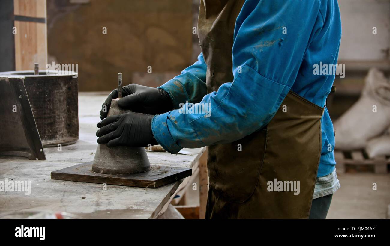 Concrete industry worker preparing the form for working with concrete