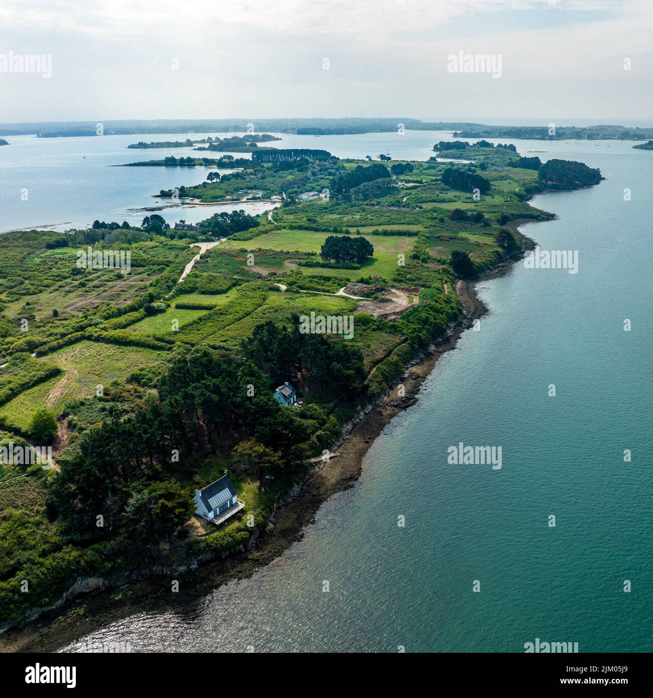 An aerial view of the beautiful islands of Ile-aux-Moines in Bretagne, France covered in lush greenery Stock Photo