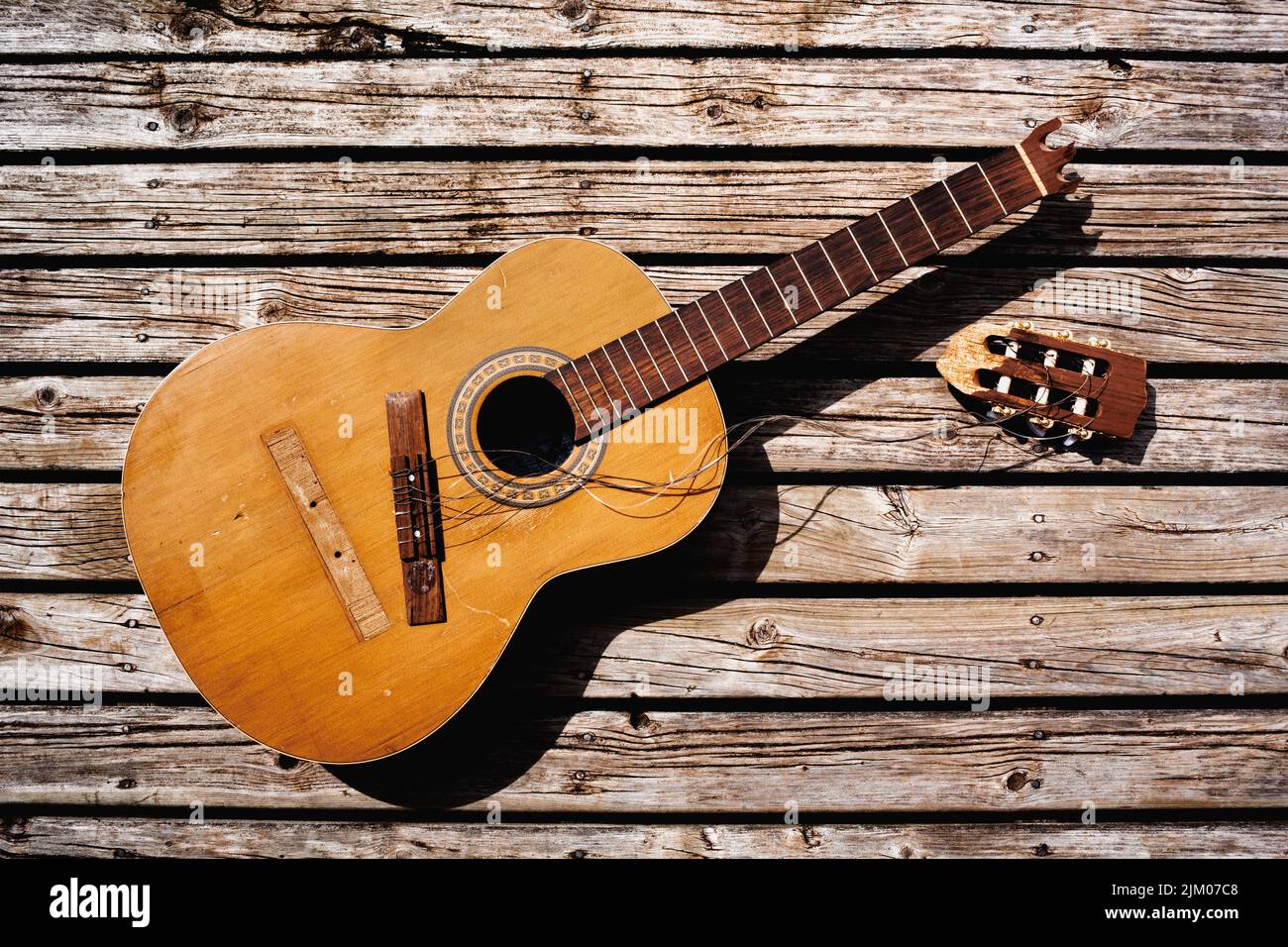 Classical nylon string guitar with broken off headstock and bridge Stock Photo Alamy