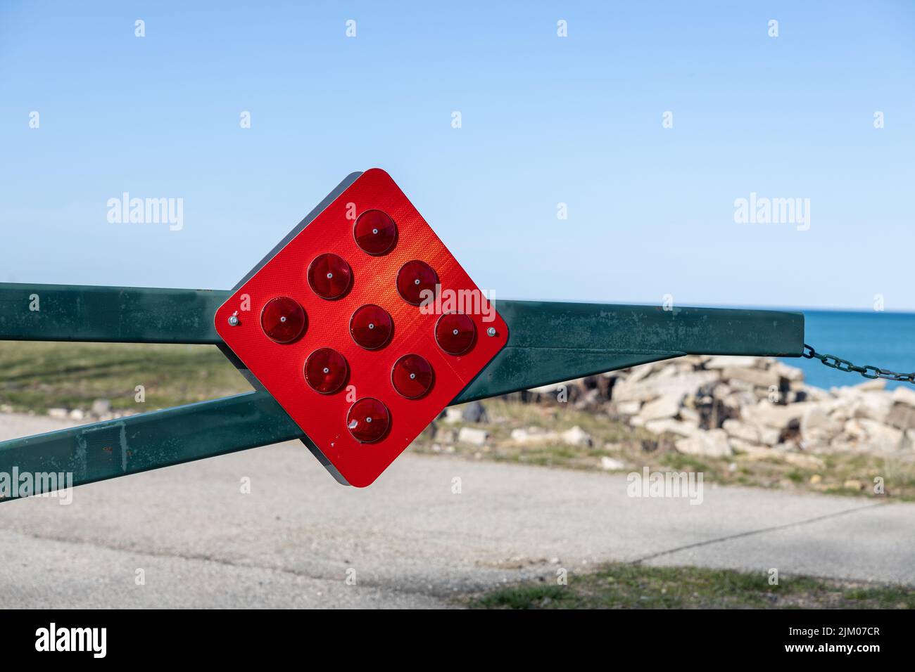 Red stop and turn detour road sign, regulatory sign outdoors Stock