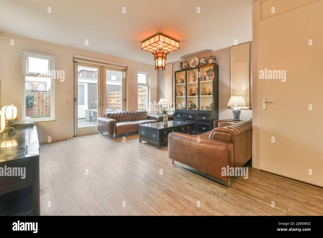 Interior design of modern minimalist style living room with large