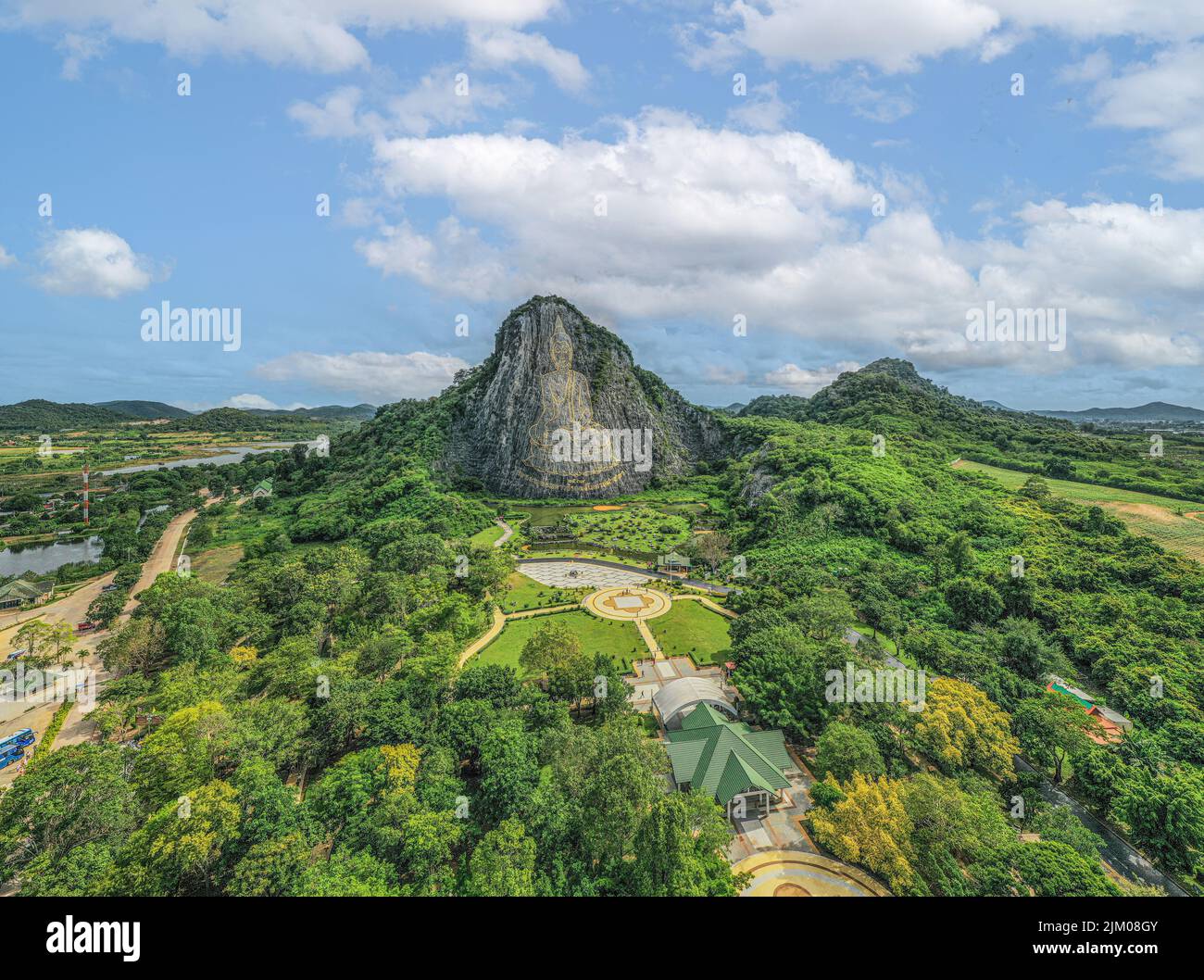 Buddha Mountain or Khao Chi Chan is a limestone hilltop in Na Chom Thian that has become a Pattaya landmark due to its 109m by 70m golden Buddha laser Stock Photo