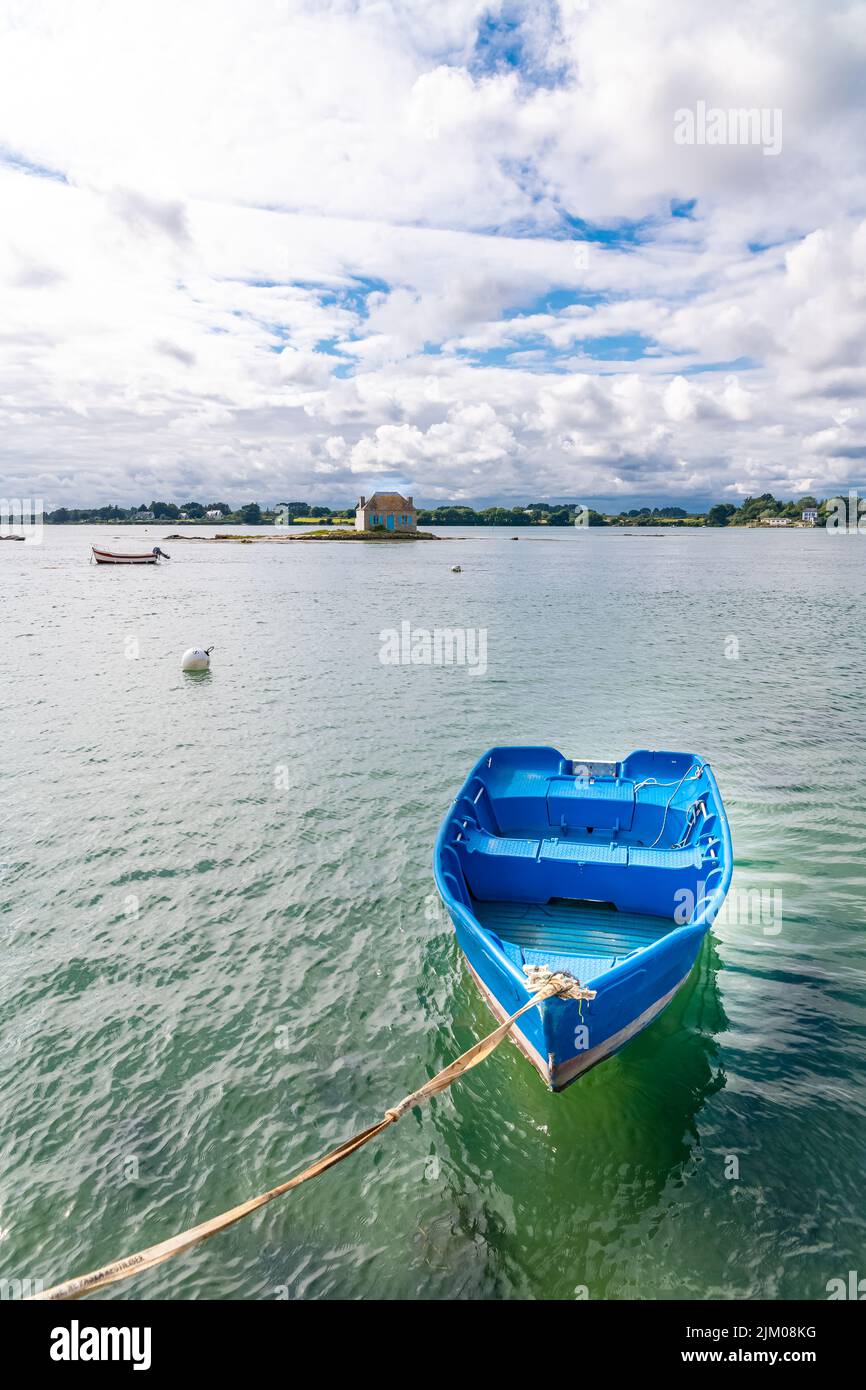 The house of SaintCado in Brittany, on the Etel river, with a blue row